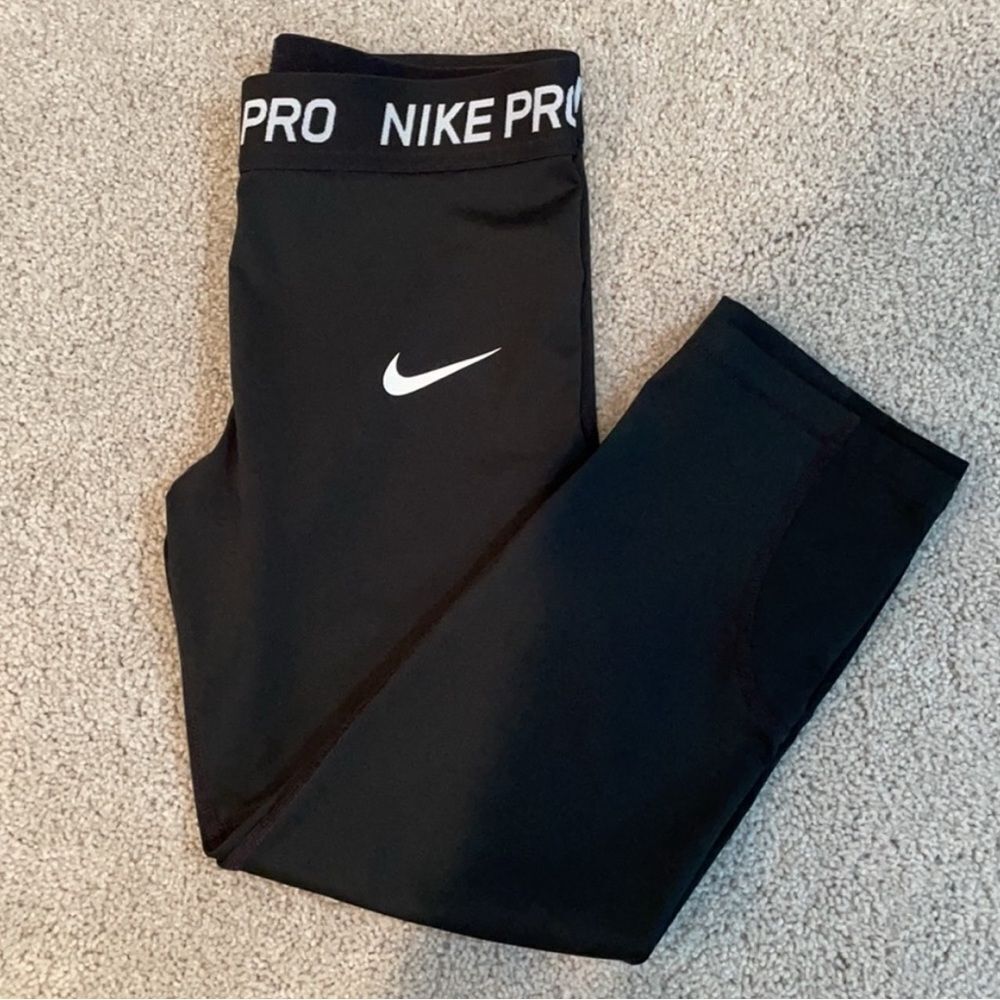 Girls- Nike Pro Black pants. This are not full length.